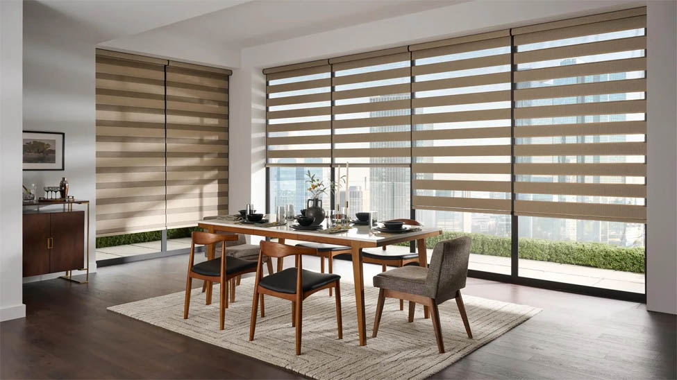 Zebra shades in dining room create a striking style