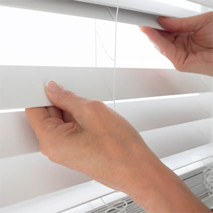 Close-up of faux wood blind slats