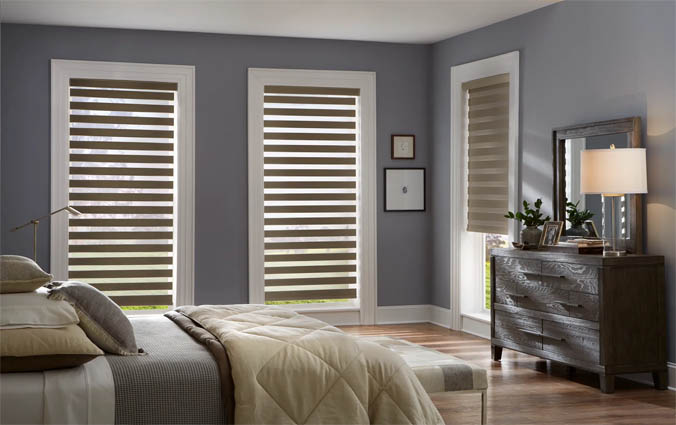 Zebra shades in a bedroom