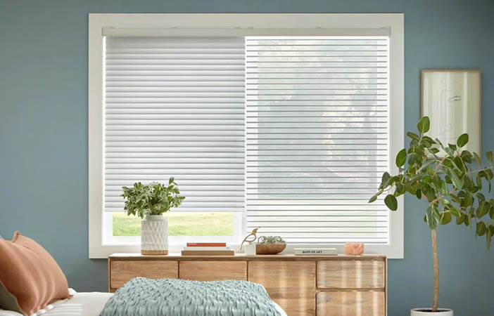 Sheer shades in a bedroom