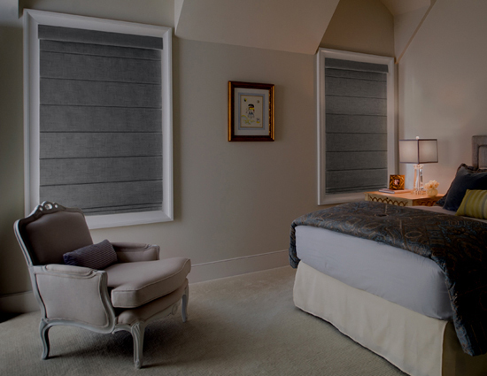 Roman shades in bedroom