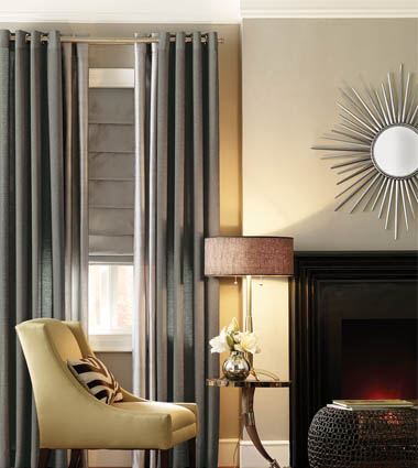 Roman shades and layered drapery