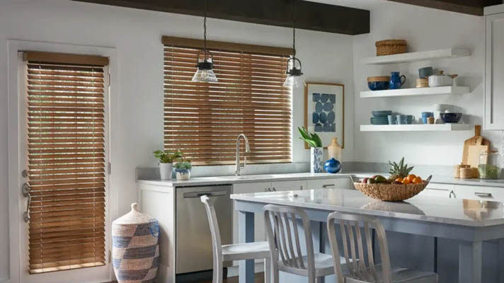 Wood tone faux wood blinds in kitchen