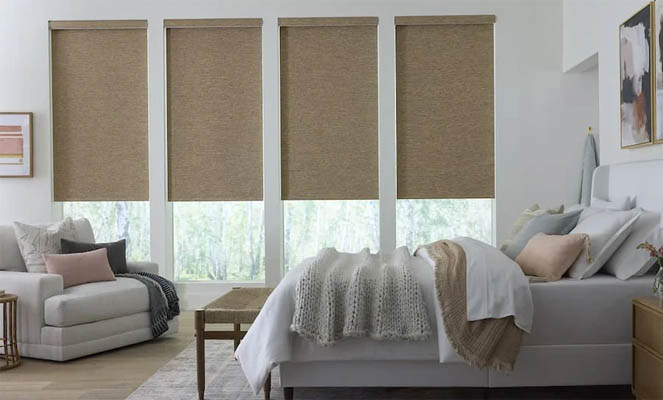 Roller shades in a bedroom