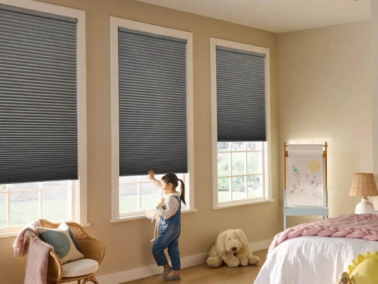Insulating cellular shades in a kids room